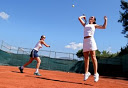 Family cultural immersion abroad - playing tennis